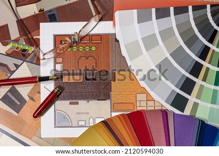 Architecture design and painted update color palette of drawings in the office. Apartment design concept
