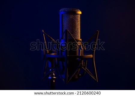 Recording studio microphone dark background 