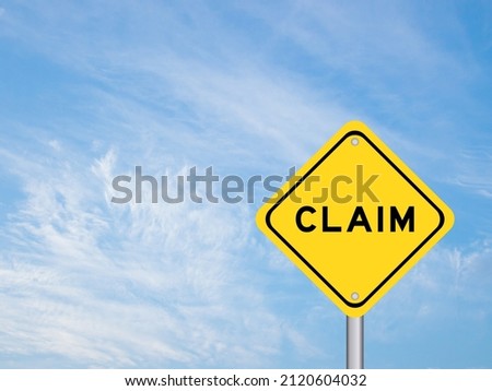 Yellow transportation sign with word claim on blue color sky background