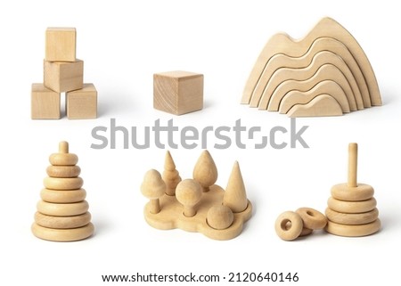 Organic baby teethers isolated on white background. Wooden animal toys set for babies. set of wooden toys isolated on white background. Royalty-Free Stock Photo #2120640146