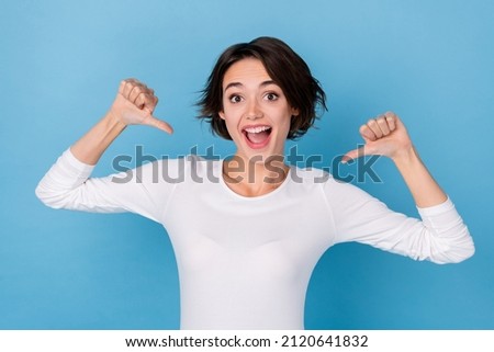Photo of excited cheerful screaming lady pointing fingers herself advertising promo isolated on blue color background