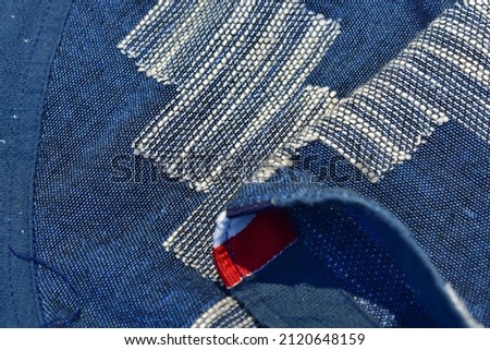 The texture of denim blue jeans is combined with flannel with a thread that is used as a motif. This fabric is suitable for formal or informal shirts and pants, white background