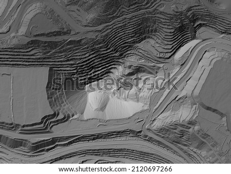 Model of a mine elevation. GIS 3D product made after processing aerial pictures taken from a drone. It shows excavation site with steep rock walls Royalty-Free Stock Photo #2120697266