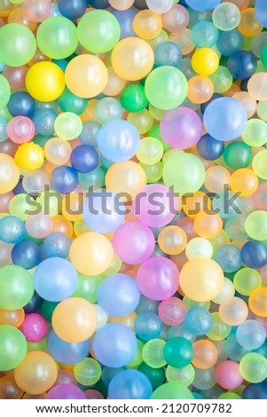 A vertical image filled with colorful and beautiful balls. A high-resolution picture that's good for background photoshop.