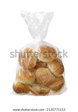 hamburger bun in plastic bag isolated on white with clipping path