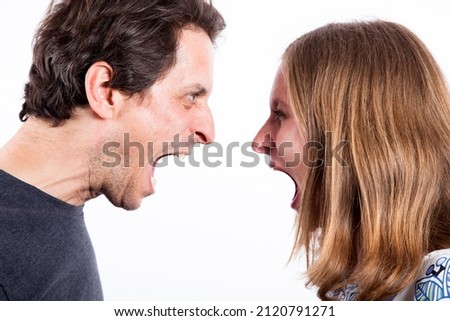 Man and woman screaming at each other Royalty-Free Stock Photo #2120791271