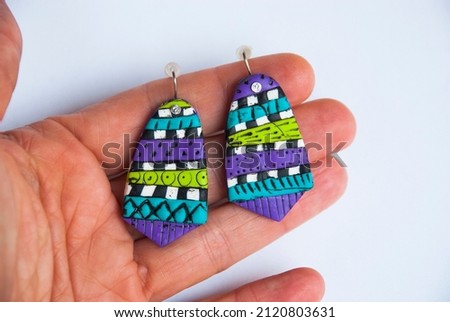 Modern style colorful striped earrings of polymer clay.