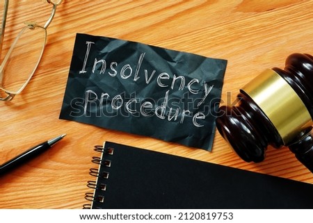 Insolvency procedure is shown on a business photo using the text Royalty-Free Stock Photo #2120819753