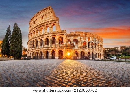 Rome, Italy at the Colosseum Amphitheater with the sunrise through the entranceway.  Royalty-Free Stock Photo #2120859782