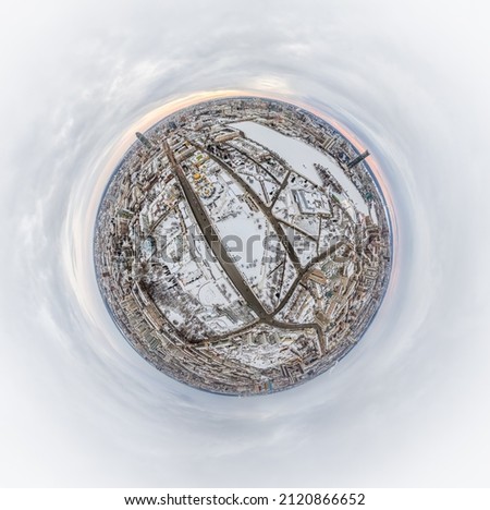 Aerial winter city view with crossroads and roads, houses, buildings, parks and bridges. Copter shot. Little planet sphere mode. Spherical panorama of the city, little planet. Yekaterinburg, Russia. Royalty-Free Stock Photo #2120866652