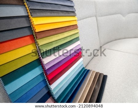 Catalog of bright colorful fabric samples for furniture manufacturing. Furniture fabric collection. furniture upholstery