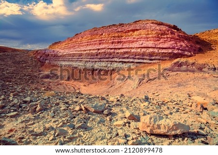 Mountain landscape, desert. Colorful sandstone. National Park Makhtesh Ramon Crater in Negev desert, Israel Royalty-Free Stock Photo #2120899478