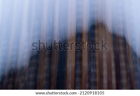 motion blur defocused image of big building