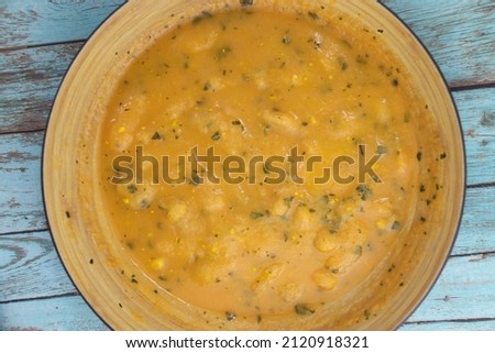 Pumpkin soup on a bowl