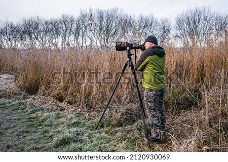 Photo Sniper, Wild Life photographer in the Marshland, Devon, England