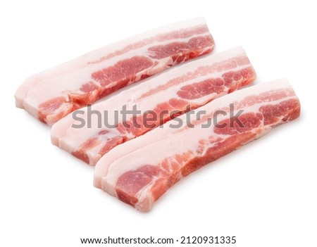 Streaky pork isolated on white background, Slide pork belly raw or Raw sliced bacon on white background with clipping path. Royalty-Free Stock Photo #2120931335