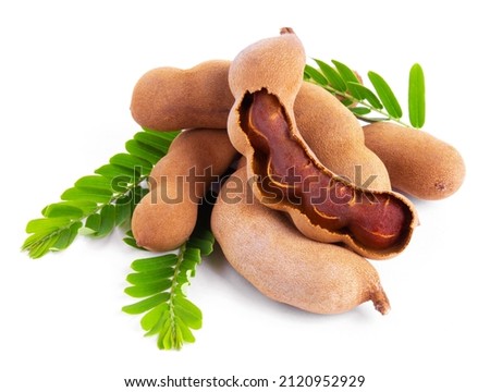 
Ripe sweet tamarind with green leaves isolated on white background. Royalty-Free Stock Photo #2120952929