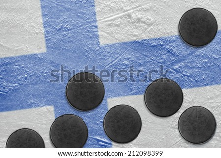 Washers and the image of the Finnish flag on a hockey rink