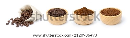 Roasted coffee beans in sack bag and coffee powder (ground coffe) in wooden bowl isolated on white background.  Royalty-Free Stock Photo #2120986493