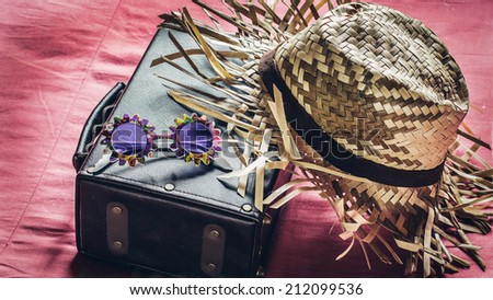 Vintage suitcases,hat and Sunglasses on suitcases, concept of travel
