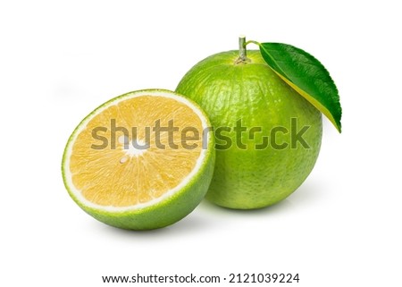 Aurantium citrus (Bitter orange or Seville orange) with cut in half sliced and green leaf isolated on white background. Royalty-Free Stock Photo #2121039224