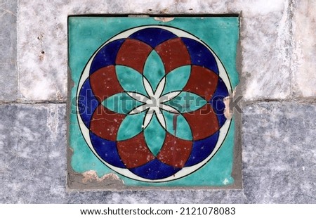 old ceramic tile on the Wall