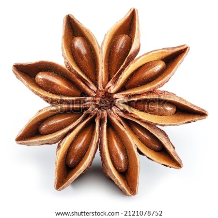 Anise star and aniseeds, spice with strong taste used in cooking, isolated on white background. Royalty-Free Stock Photo #2121078752