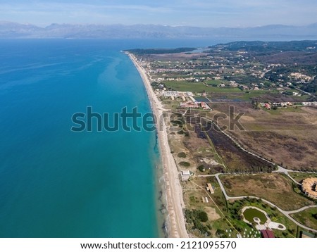 Aerial panoramic drone view of almyros beach in north corfu greece