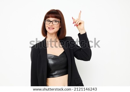photo pretty woman posing with glasses a leather suit black jacket Lifestyle unaltered