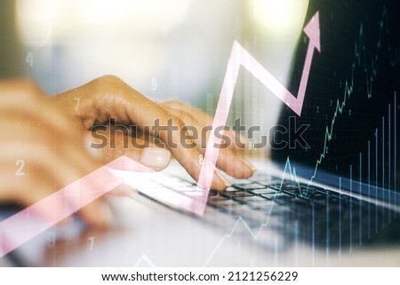 Multi exposure of abstract creative financial chart with upward arrow and hand typing on laptop on background, rise and breakthrough concept
