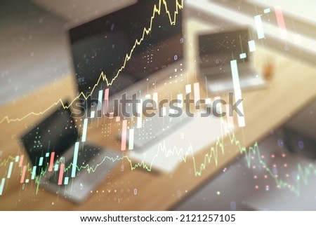 Multi exposure of abstract financial diagram and modern desk with computer on background, banking and accounting concept