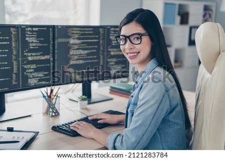 Photo of successful lady editor sit desk use gadget web html page content improving in light workspace