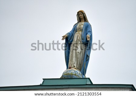 Statues of Holy Women in Roman Catholic Church isolated on white background. Royalty-Free Stock Photo #2121303554