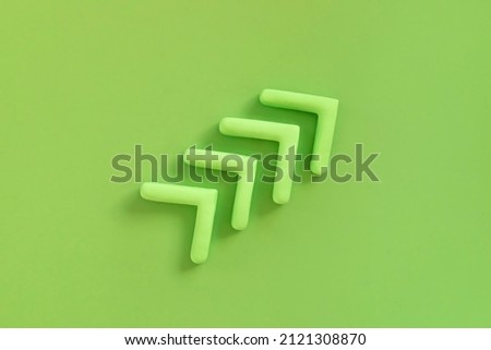 Arrows pointing up, green color. Concept of development, profit, progress. Arrow upwards show growing of the business, success of ecological marketing. Royalty-Free Stock Photo #2121308870
