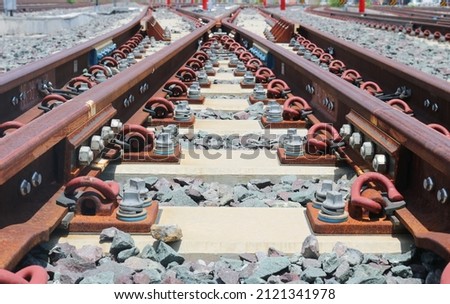 Train railroad track details closeup.