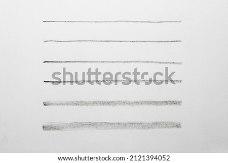 Set of black pastels lines on a white background. Hand drawn grunge lines.  Royalty-Free Stock Photo #2121394052