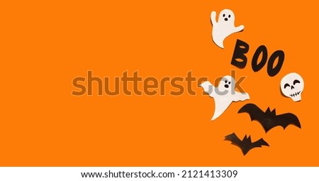 Halloween set decorations with ghost, bat and notebook list on yellow background. Holiday party, minimal card, spooky concept. flat lay, copy space, top view