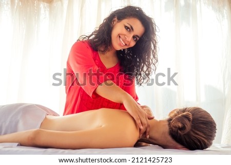 client and massagist master in aurvedic spa centre Royalty-Free Stock Photo #2121425723