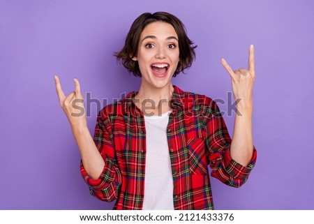 Photo of hooray millennial bob hairdo lady yell show rock sign wear red shirt isolated on purple color background
