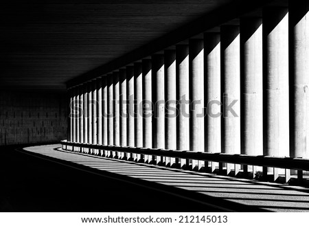 Tunnel with columns in black and white photo, abstract tunnel photo, black and white photo, architecture details close up in black and white, way, road, columns, diagonal, street photography