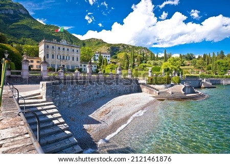 Como Lake. Idyllic beach and Villa Sola Cabiati in Tremezzo on Lake Como view, Lombardy region of Itally Royalty-Free Stock Photo #2121461876