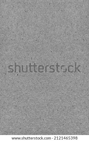 Grey natural art paper textured background recycled craft pattern large vertical vintage rustic retro album wrapping sheet spotted detailed old grungy closeup dark tissue fiber blank empty copy space