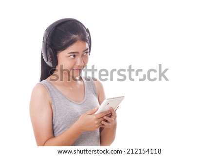 Young women with tablet pc and headphones. 