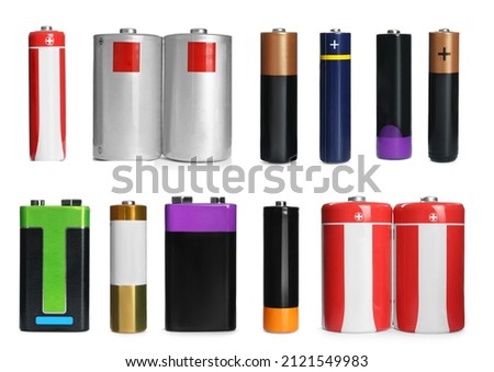 Many batteries of different types on white background, collage Royalty-Free Stock Photo #2121549983