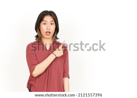 Showing Product and Pointing Side Of Beautiful Asian Woman Isolated On White Background