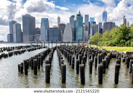New York city skyline waterfront lifestyle. View of Manhattan downtown from the Brooklyn bridge park salt marsh. 