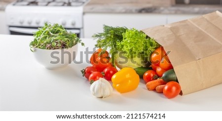 fresh vegetables on white table in kitchen