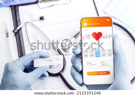 Doctor online medical application. Doctor holding digital smartphone. Healthcare medicine app on mobile phone screen. Mobile medicine, online doctor
