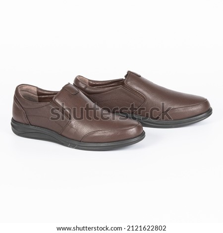 stylish men's shoes photographed on a white background