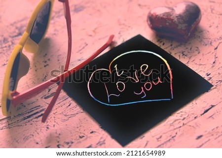 Note I love you for Valentines Day in retro toning. Art scratch paper for message